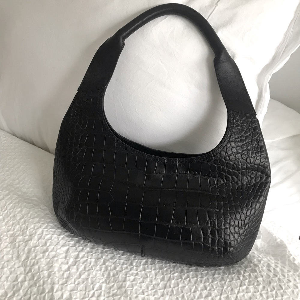Worn a couple times Authentic Salvatore Ferragamo black bag